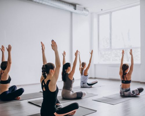 Yoga group classes inside the gym